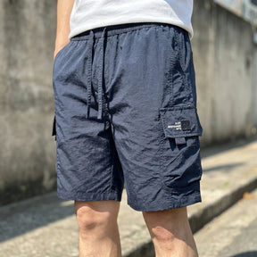 [Leve 4, Pague Só 2!] Bermuda Vektor Masculina em Nylon Texturizado de Alta Durabilidade com Bolsos Cargo e Etiqueta Industrial + BRINDES